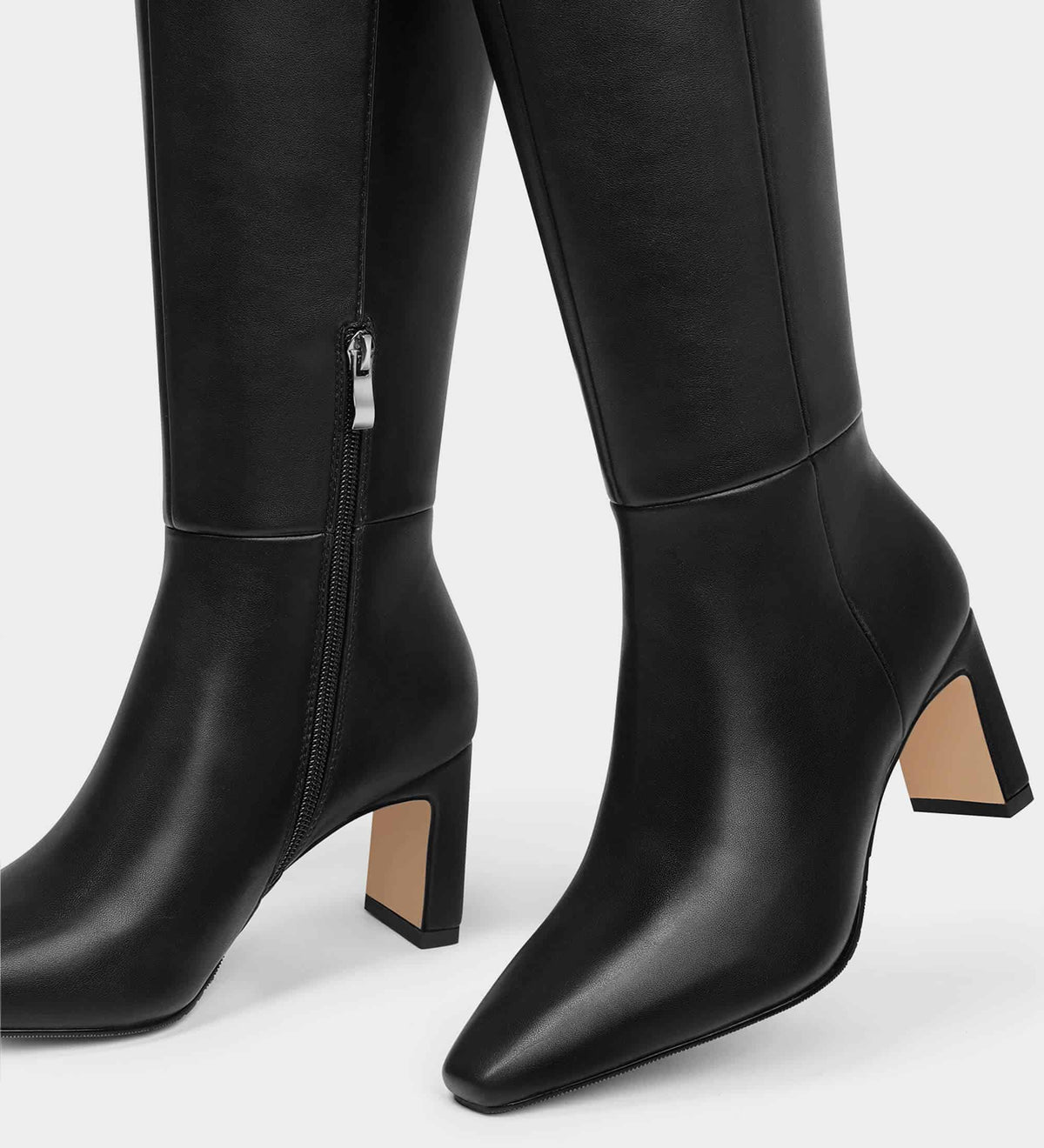 black pointed toe boots