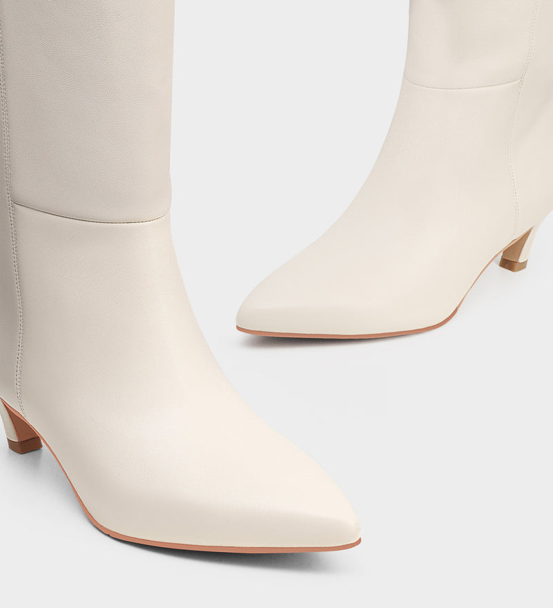 white over the knee boots​